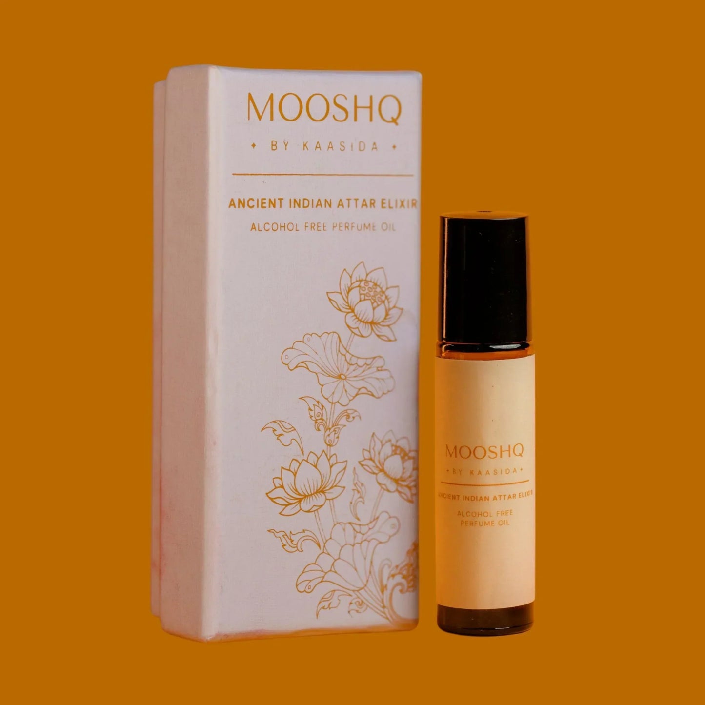 MOOSHQ by Kaasida perfume 10 ML bottle and packaging on an orange background