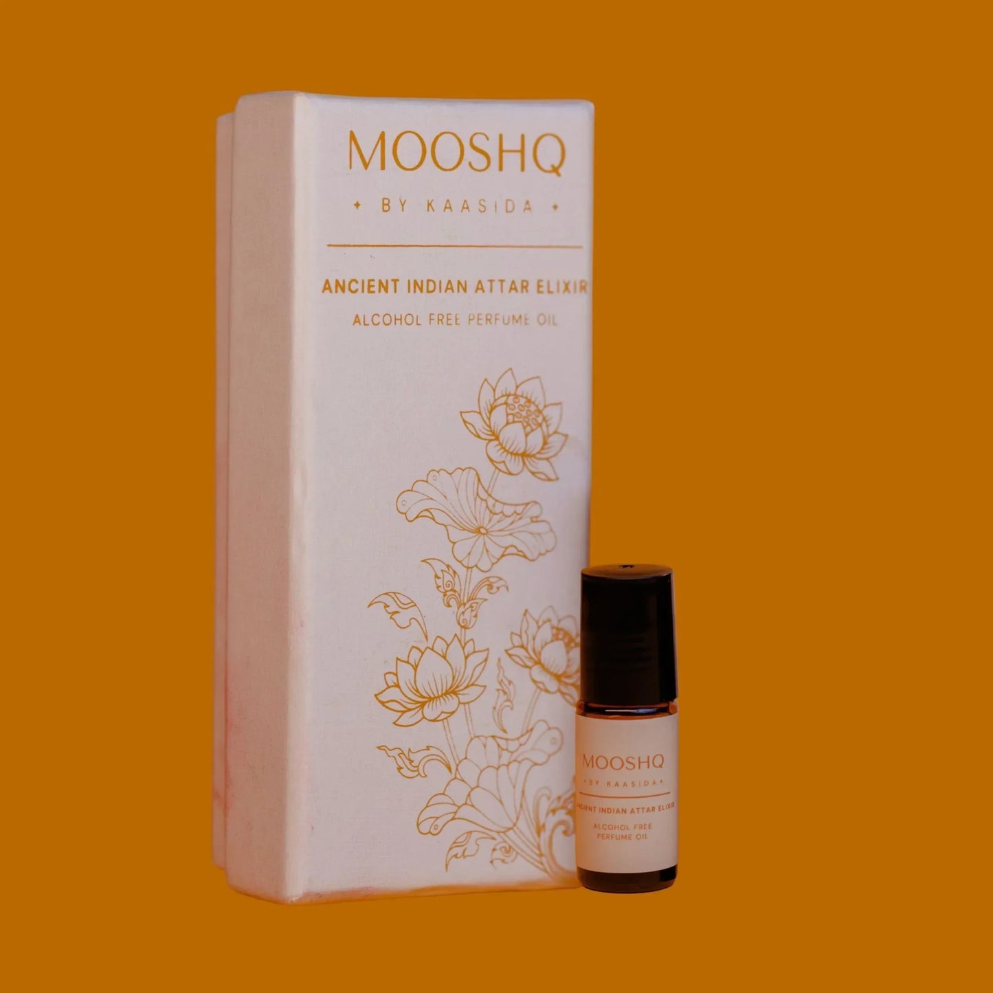 MOOSHQ by Kaasida perfume 2 ML bottle and packaging on an orange background