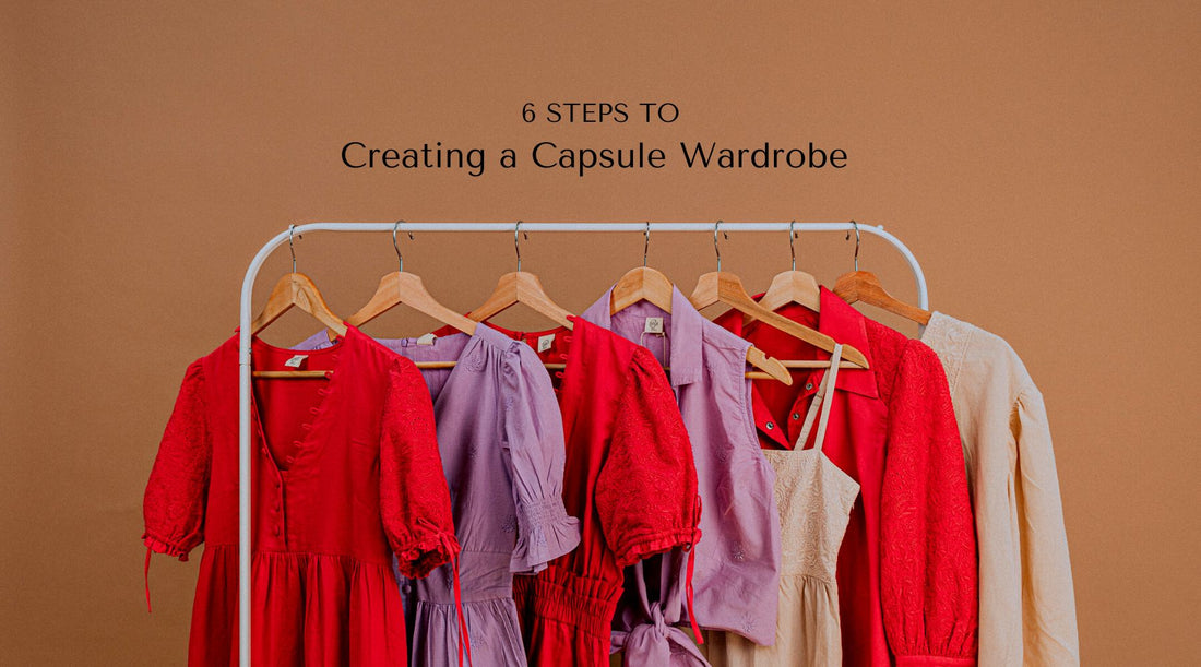 Hand embroidered indi dresses and tops hanging on a clothing rack with text on top that reads "6 Steps to Creating a Capsule Wardrobe"