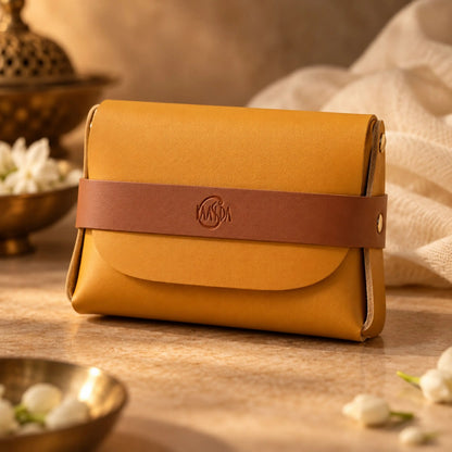 Yellow vegan leather small pouch with kaasida engraved on it