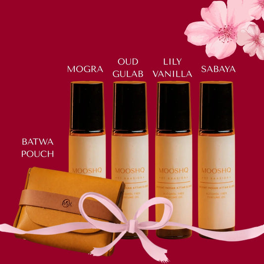 Mooshq perfume Oil set with a Batwat vegan leather pouch on a red background