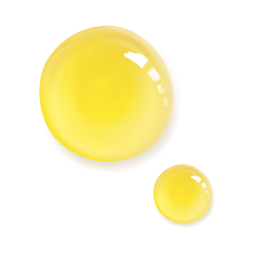 Two yellow perfume oil drops on a white background