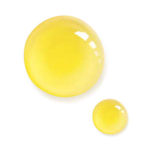 Two yellow perfume oil drops on a white background