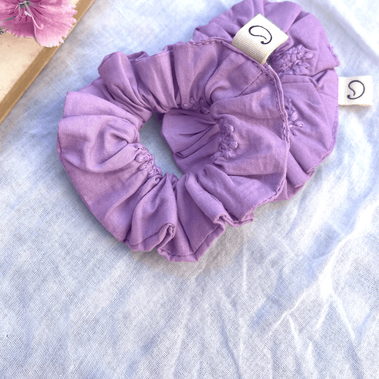 Purple hair scrunchie made with fabric scraps